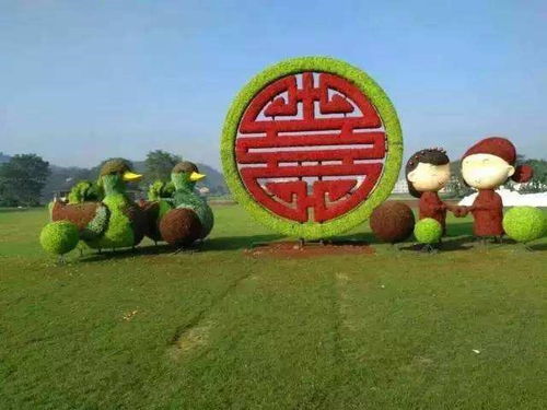 仿真綠雕也可以做沙發(fā)的樣子哦 鴛鴦婚慶仿真綠雕批發(fā)價(jià)